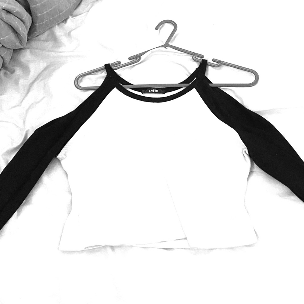 black and white cropped top with shoulder cut outs